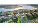 Aerial view of house near lake in a residential area at 16719 Sanctuary Dr, Winter Garden, FL 34787