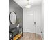 Bright entryway with a console table and mirror at 16719 Sanctuary Dr, Winter Garden, FL 34787