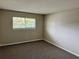 Well-lit bedroom featuring a window and neutral decor at 1695 Lee Rd # B211, Winter Park, FL 32789