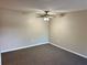 Spacious bedroom with ceiling fan and neutral wall paint at 1695 Lee Rd # B211, Winter Park, FL 32789