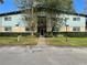 Building exterior with landscaping and walkway at 1695 Lee Rd # B211, Winter Park, FL 32789