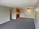 Living room with open concept to kitchen area at 1695 Lee Rd # B211, Winter Park, FL 32789