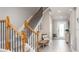 Bright entryway with a staircase and bench at 1696 Andover Ridge Dr, Deland, FL 32720