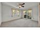 Bright bedroom with carpet, window, and ceiling fan at 1720 Algonquin Trail, Maitland, FL 32751