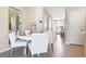 Dining area with white round table and chairs, near entryway at 2187 Longleaf Rd, Davenport, FL 33837