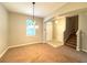 Bright dining area near entryway and stairs at 2878 Grasmere View Pkwy, Kissimmee, FL 34746