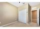 Bedroom with double door closet and access to bathroom at 2902 Boating Blvd, Kissimmee, FL 34746