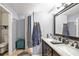 Bathroom with double vanity and step-in shower at 2924 Antique Oaks Cir # 46, Winter Park, FL 32792