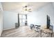 Second bedroom with a TV and home gym equipment at 2924 Antique Oaks Cir # 46, Winter Park, FL 32792