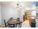 Small dining area with round table and four chairs at 2924 Antique Oaks Cir # 46, Winter Park, FL 32792