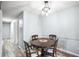 Dining area with round table and four chairs, near kitchen at 2924 Antique Oaks Cir # 46, Winter Park, FL 32792