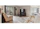 Living room with large TV and access to balcony at 2924 Antique Oaks Cir # 46, Winter Park, FL 32792