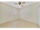 Comfortable bedroom featuring tile flooring, a ceiling fan, and neutral walls at 2961 Cedar Glen Pl, Oviedo, FL 32765