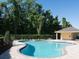 Enjoy this refreshing community pool with a covered patio area at 2961 Cedar Glen Pl, Oviedo, FL 32765