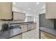 Well-lit kitchen with stainless steel appliances, ample cabinets, and durable countertops at 2961 Cedar Glen Pl, Oviedo, FL 32765