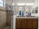 Bathroom boasts double vanity and large shower at 3649 Corsica Ln, Clermont, FL 34711