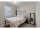 Cozy bedroom with a queen-size bed and built-in shelves at 3649 Corsica Ln, Clermont, FL 34711