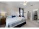 King bedroom with walk-in closet and en-suite bathroom at 3649 Corsica Ln, Clermont, FL 34711