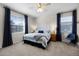 Bright bedroom with a king-size bed and ample natural light at 3649 Corsica Ln, Clermont, FL 34711