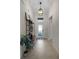 Inviting entryway with tiled floors and a stylish storage unit at 3649 Corsica Ln, Clermont, FL 34711