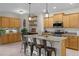 Open kitchen with large island and stainless steel appliances at 3649 Corsica Ln, Clermont, FL 34711