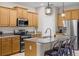 Modern kitchen with granite countertops and stainless steel appliances at 3649 Corsica Ln, Clermont, FL 34711