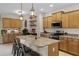 Modern kitchen with granite countertops and an island at 3649 Corsica Ln, Clermont, FL 34711