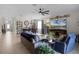 Spacious living room with comfortable seating and large TV at 3649 Corsica Ln, Clermont, FL 34711