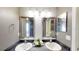 Double vanity bathroom with elegant framed mirrors at 3917 Derby Dr, Lakeland, FL 33809