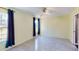 Bright bedroom featuring tile floors and large windows at 3917 Derby Dr, Lakeland, FL 33809