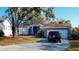 House exterior showcasing a driveway and landscaping at 3917 Derby Dr, Lakeland, FL 33809