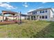 Large backyard with deck, gazebo and home at 394 Singing Tree Ln, Winter Springs, FL 32708