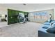 Versatile bonus room with a built-in workspace and comfortable sitting area at 394 Singing Tree Ln, Winter Springs, FL 32708