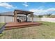 Relaxing gazebo with seating on a deck at 394 Singing Tree Ln, Winter Springs, FL 32708