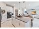 Island kitchen with stainless steel appliances and open concept at 394 Singing Tree Ln, Winter Springs, FL 32708