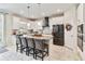Spacious kitchen with an island and stainless steel appliances at 394 Singing Tree Ln, Winter Springs, FL 32708