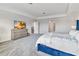 Spacious main bedroom with large TV and plenty of room for furniture at 394 Singing Tree Ln, Winter Springs, FL 32708