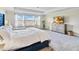 Bright and spacious main bedroom with large windows and a dresser at 394 Singing Tree Ln, Winter Springs, FL 32708
