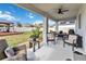 Cozy patio furniture under covered area at 394 Singing Tree Ln, Winter Springs, FL 32708