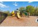 Community playground with slides and climbing structures at 394 Singing Tree Ln, Winter Springs, FL 32708