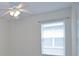 Well-lit bedroom featuring a ceiling fan and window blinds at 4911 Santa Clara Dr, Orlando, FL 32837