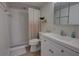 Clean bathroom with walk-in shower and white vanity at 5203 S Atlantic Ave # 815B, New Smyrna Beach, FL 32169
