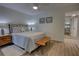 Comfortable bedroom with queen bed and access to bathroom at 5203 S Atlantic Ave # 815B, New Smyrna Beach, FL 32169