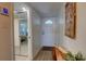Entryway with bench and wood-look flooring at 5203 S Atlantic Ave # 815B, New Smyrna Beach, FL 32169