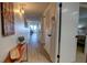 Long hallway with light walls and wood-look flooring at 5203 S Atlantic Ave # 815B, New Smyrna Beach, FL 32169