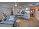 Modern kitchen with stainless steel appliances and white cabinetry at 5203 S Atlantic Ave # 815B, New Smyrna Beach, FL 32169