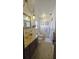 Retro bathroom with tiled floors and shower at 547 Queens Mirror Cir, Casselberry, FL 32707