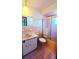 Bathroom with pink tile and shower/tub combo at 547 Queens Mirror Cir, Casselberry, FL 32707