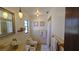 Bathroom with updated vanity, toilet and shower at 547 Queens Mirror Cir, Casselberry, FL 32707
