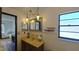 Bathroom with updated vanity, toilet and shower at 547 Queens Mirror Cir, Casselberry, FL 32707